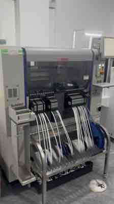 SMT placement equipment and component feeders on the factory floor